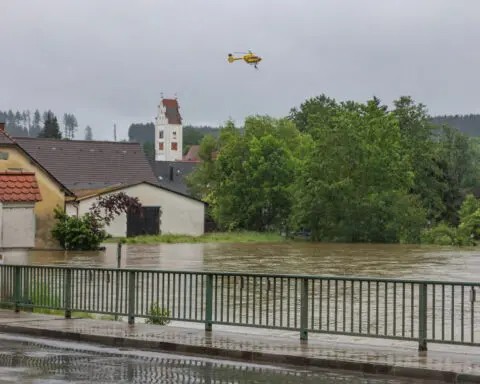 Rescue worker dies, several thousand evacuated in southern Germany floods