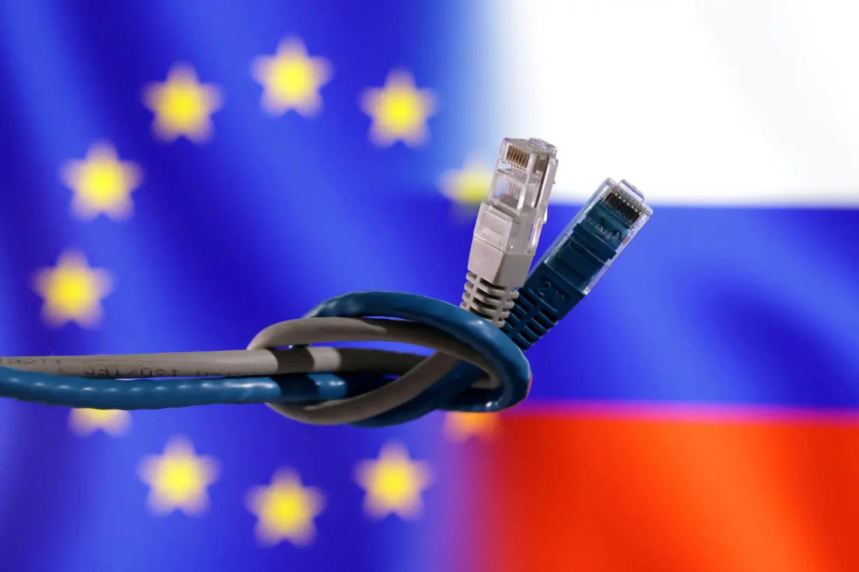 FILE PHOTO: Illustration shows EU and Russian flags