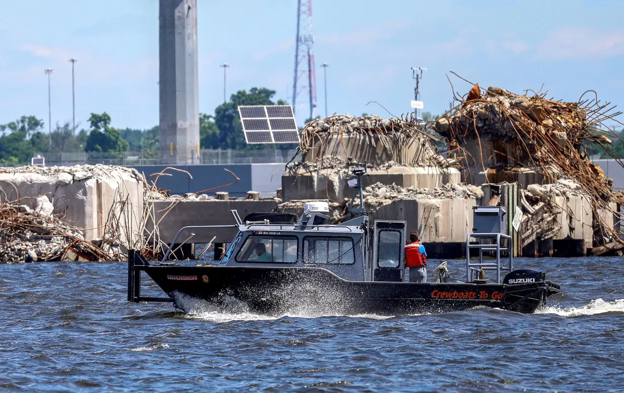 FILE PHOTO: Clean-up continues as Baltimore's main shipping channel prepares to reopen following the collapse of the Francis Scott Key Bridge