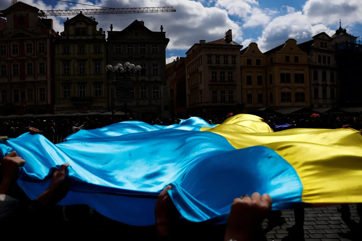 FILE PHOTO: People attend a rally over Ukraine conflict in Prague