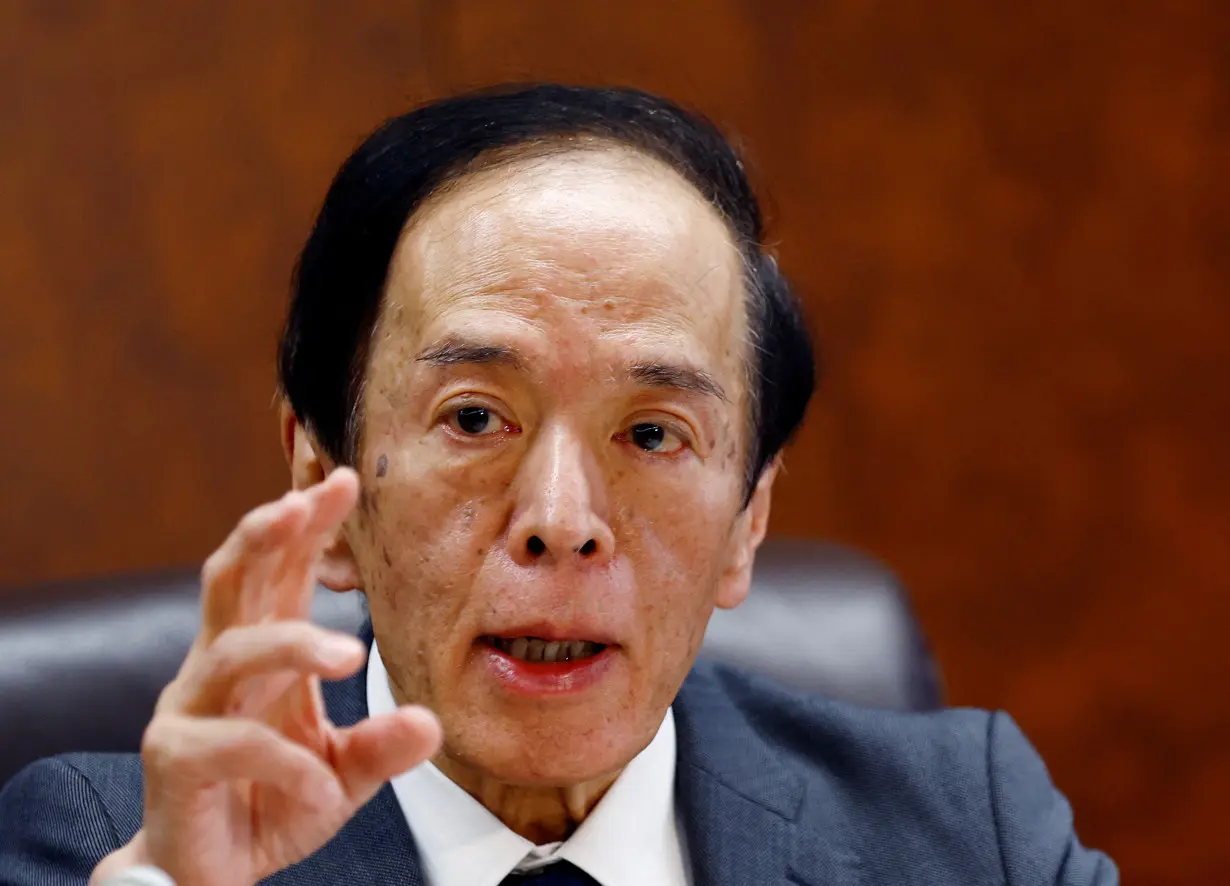 FILE PHOTO: Bank of Japan Governor Kazuo Ueda speaks at a group interview with media in Tokyo