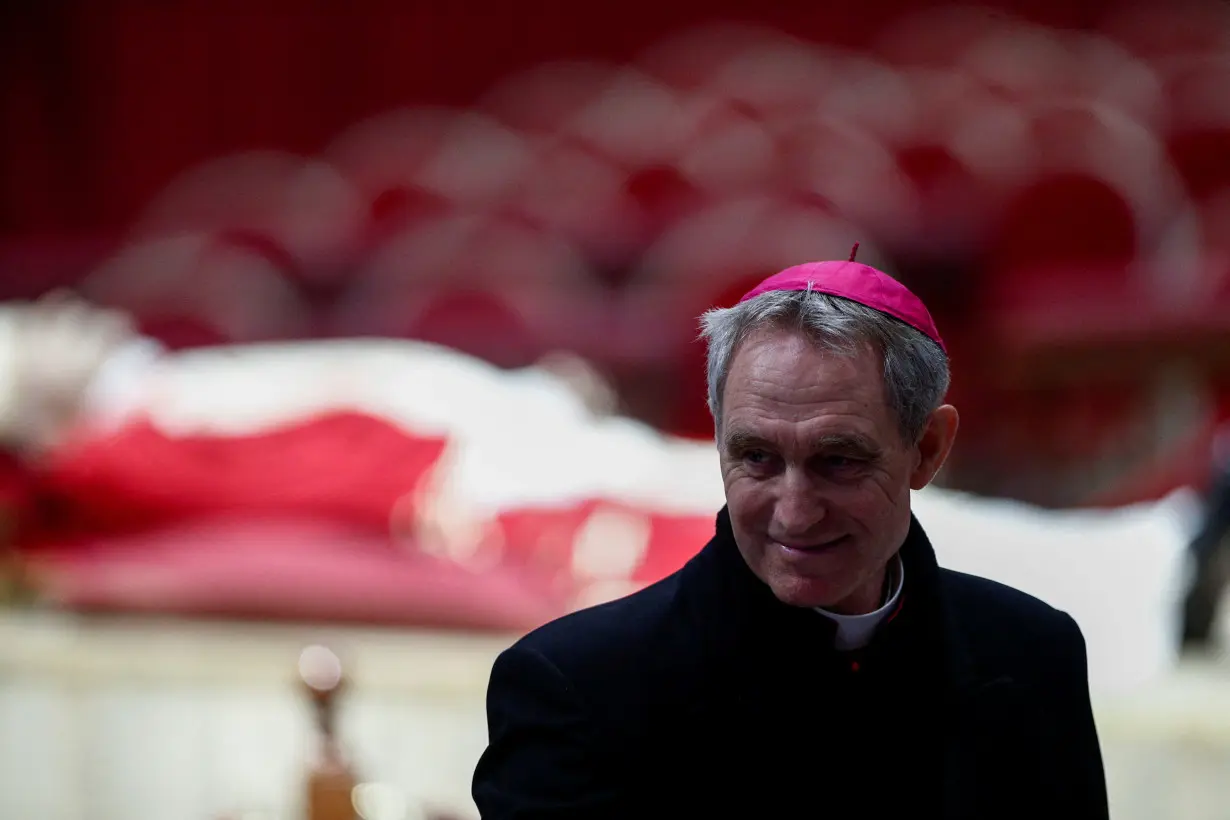 FILE PHOTO: Faithful pay homage to former Pope Benedict in St. Peter's Basilica at the Vatican