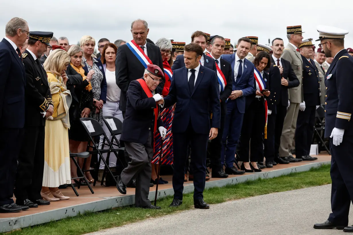 Macron pays tribute to civilian victims of D-Day bombings in Normandy