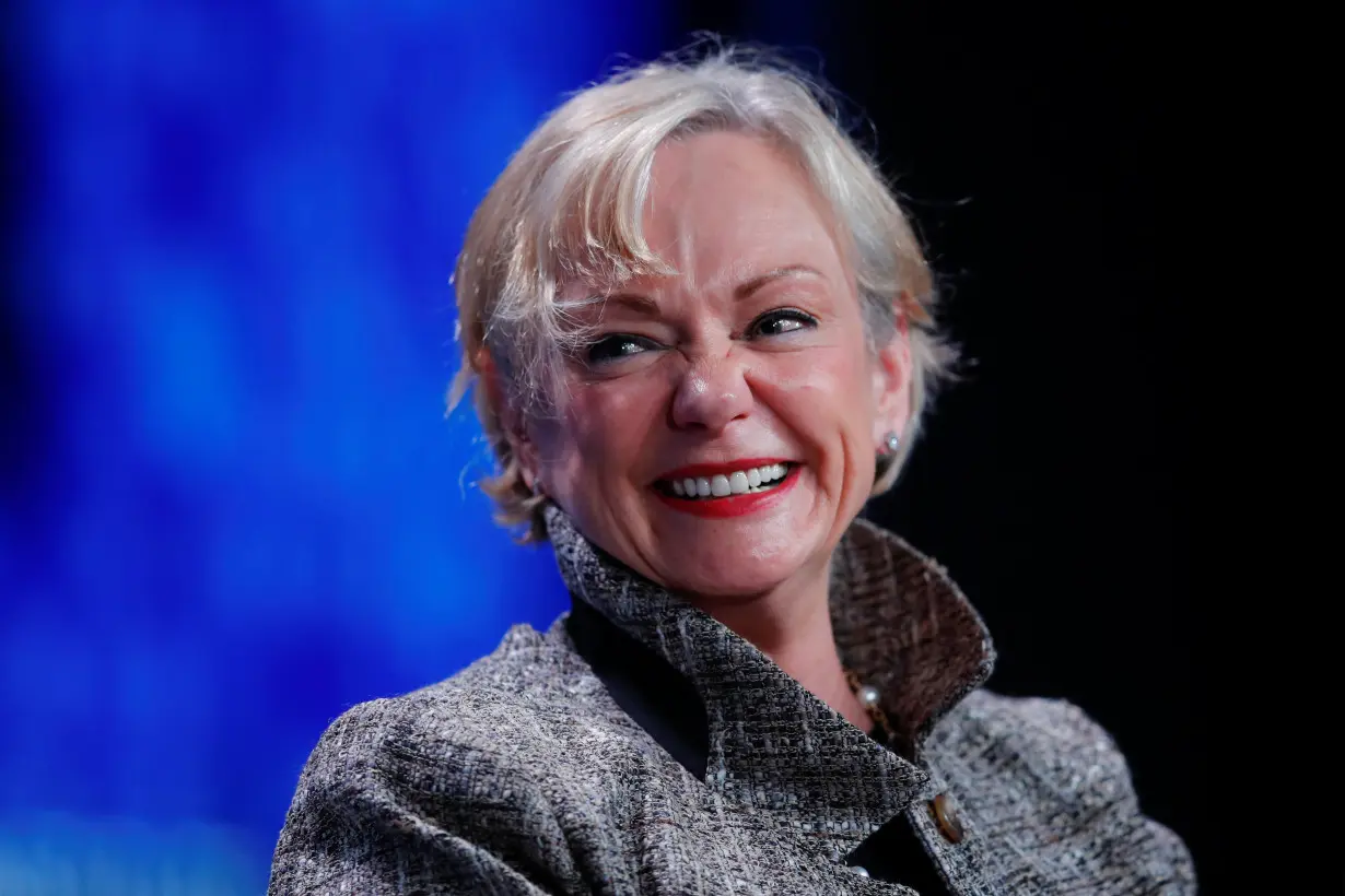 Christine McCarthy, Senior Executive Vice President and Chief Financial Officer, The Walt Disney Company smiles as she speaks during the Milken Institute's 22nd annual Global Conference in Beverly Hills