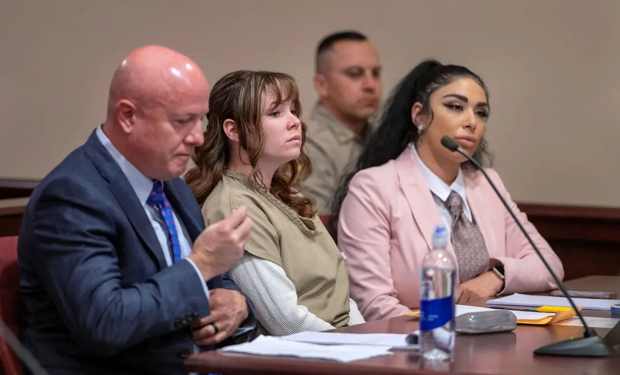 Hannah Gutierrez-Reed, the former armorer at the movie Rust, sits with her attorney Jason Bowles and paralegal Carmella Sisneros, during her sentencing hearing at First District Court, in Santa Fe, New Mexico, April 15.