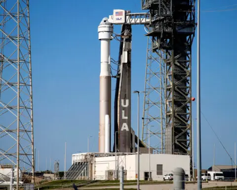 Boeing Starliner capsule's first crewed test flight postponed minutes before launch