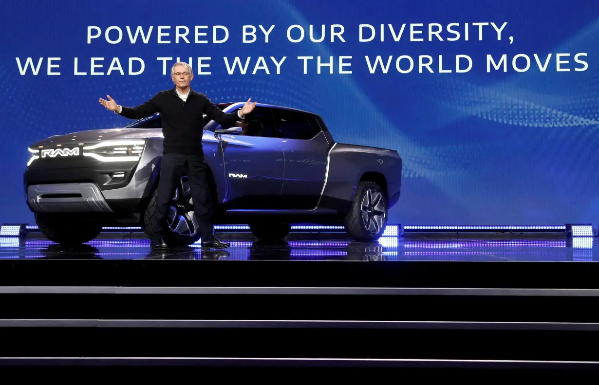 FILE PHOTO: Stellantis CEO Carlos Tavares poses in front of the Ram 1500 Revolution electric concept pickup truck during a Stellantis keynote address at CES 2023, an annual consumer electronics trade show in Las Vegas