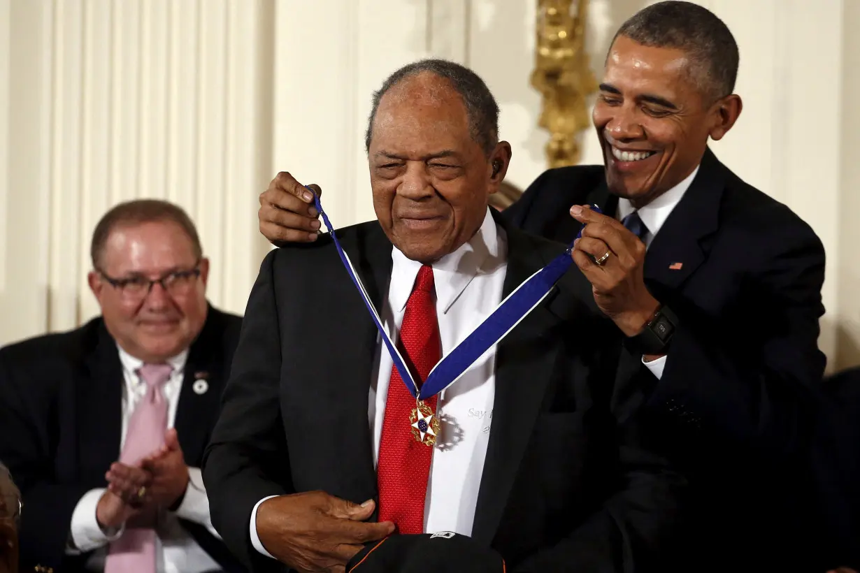 FILE PHOTO: U.S. President Barack Obama presents the Presidential Medal of Freedom to former professional baseball player Willie Mays during an event in the East Room of the White House in Washington