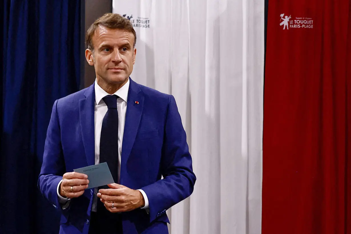 President Emmanuel Macron casts his vote in Le Touquet, northern France, June 30. President Emmanuel Macron’s party is headed for defeat after a surge in support for the far-right National Rally (RN) bloc and a strong showing for the left-wing alliance in Sunday’s first round parliamentary election.