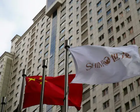 China property firms jump after big developers show smaller sales drop