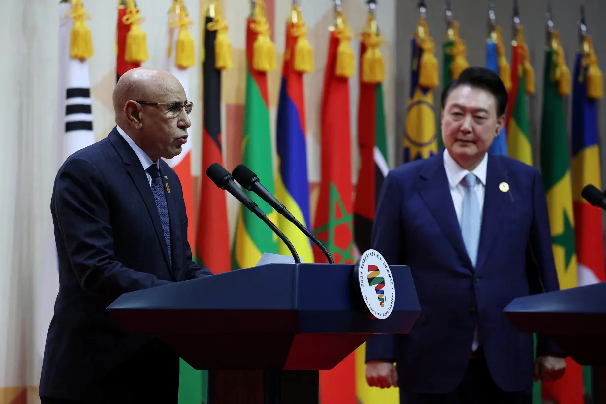 Mauritanian President Mohamed Ould Cheikh El Ghazouani speaks as South Korean President Yoon Suk Yeol looks on during a joint news conference during 2024 Korea-Africa Summit in Goyang