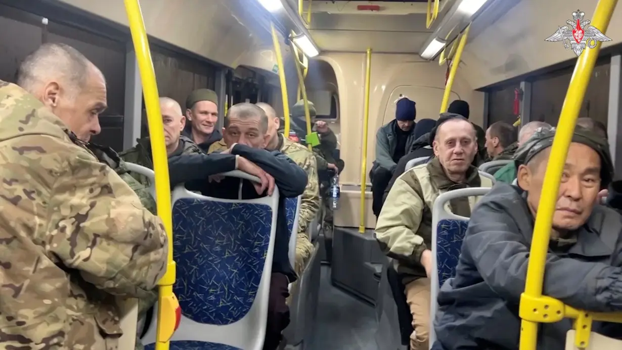 A still image from video, released by the Russian Defence Ministry, shows what it said to be captured Russian service personnel in a bus following the latest exchange of prisoners of war