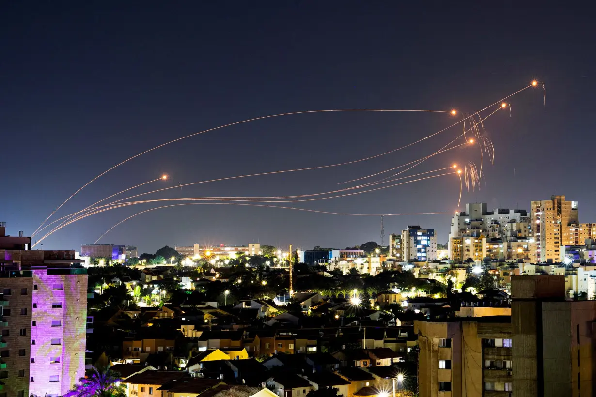 Israel's Iron Dome anti-missile system intercepts rockets launched from the Gaza Strip, after a temporary truce between Israel and the Palestinian Islamist group Hamas expired, as seen from Ashkelon