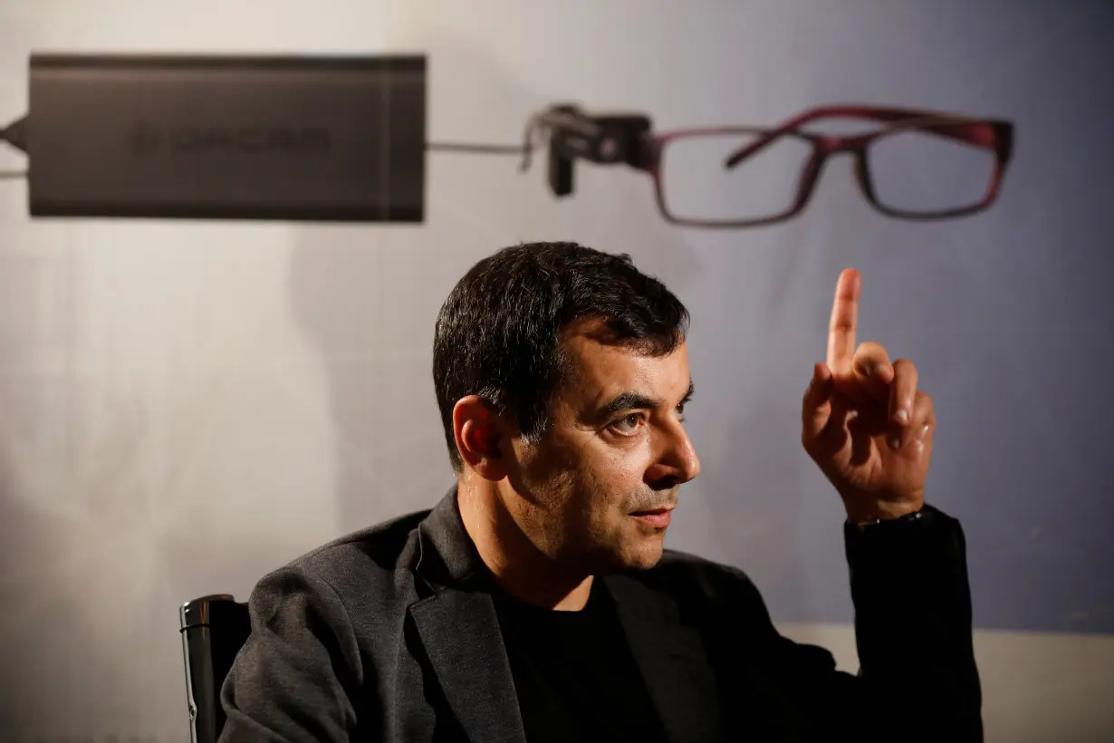 Amnon Shashua, co-founder of Israeli start-up Mobileye, gestures during an interview with Reuters at his second high-tech company, OrCam, makers of a wearable device which provides visual aid for visually impaired people, at their office in Jerusa