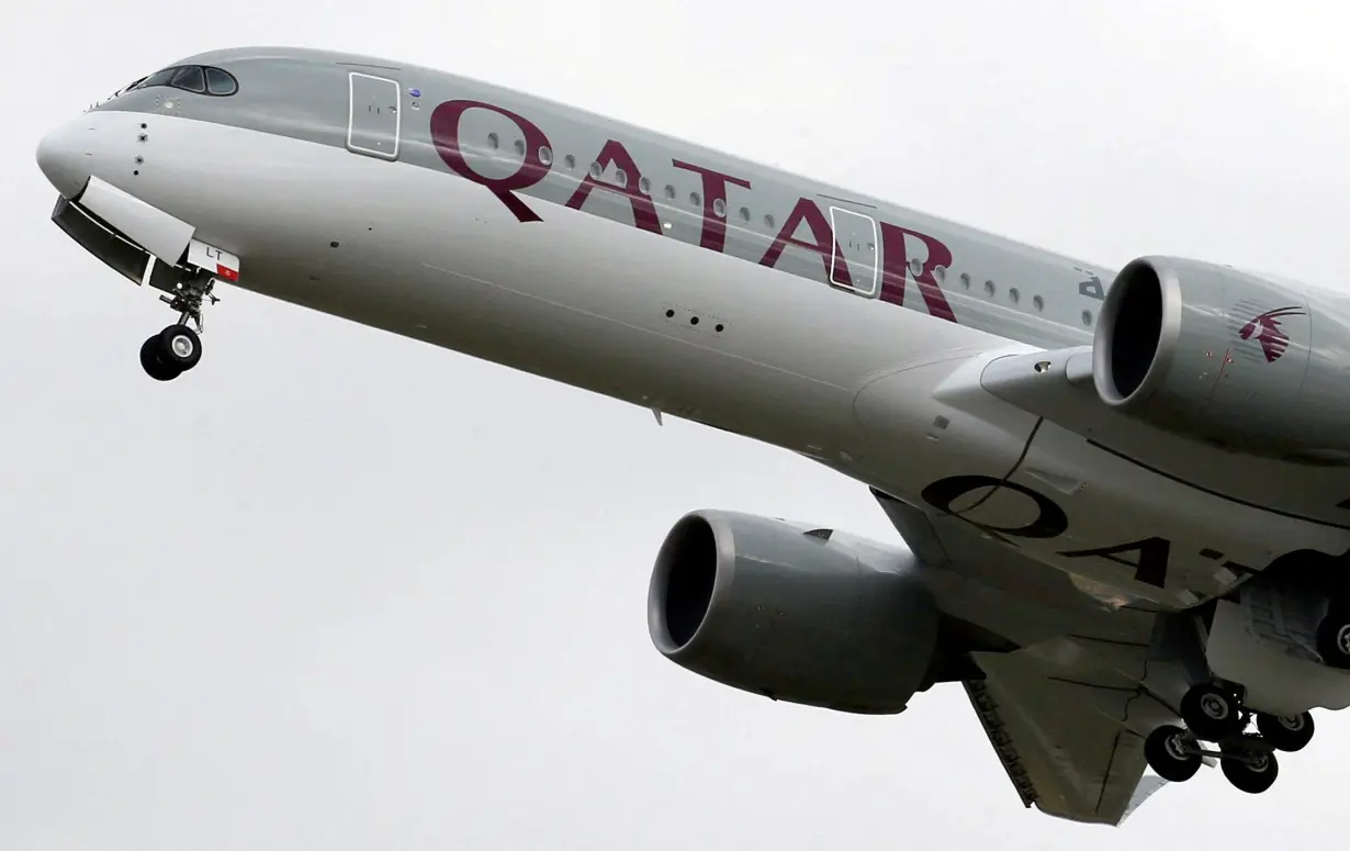 FILE PHOTO: A Qatar Airways Airbus A350 aircraft takes off in Colomiers near Toulouse