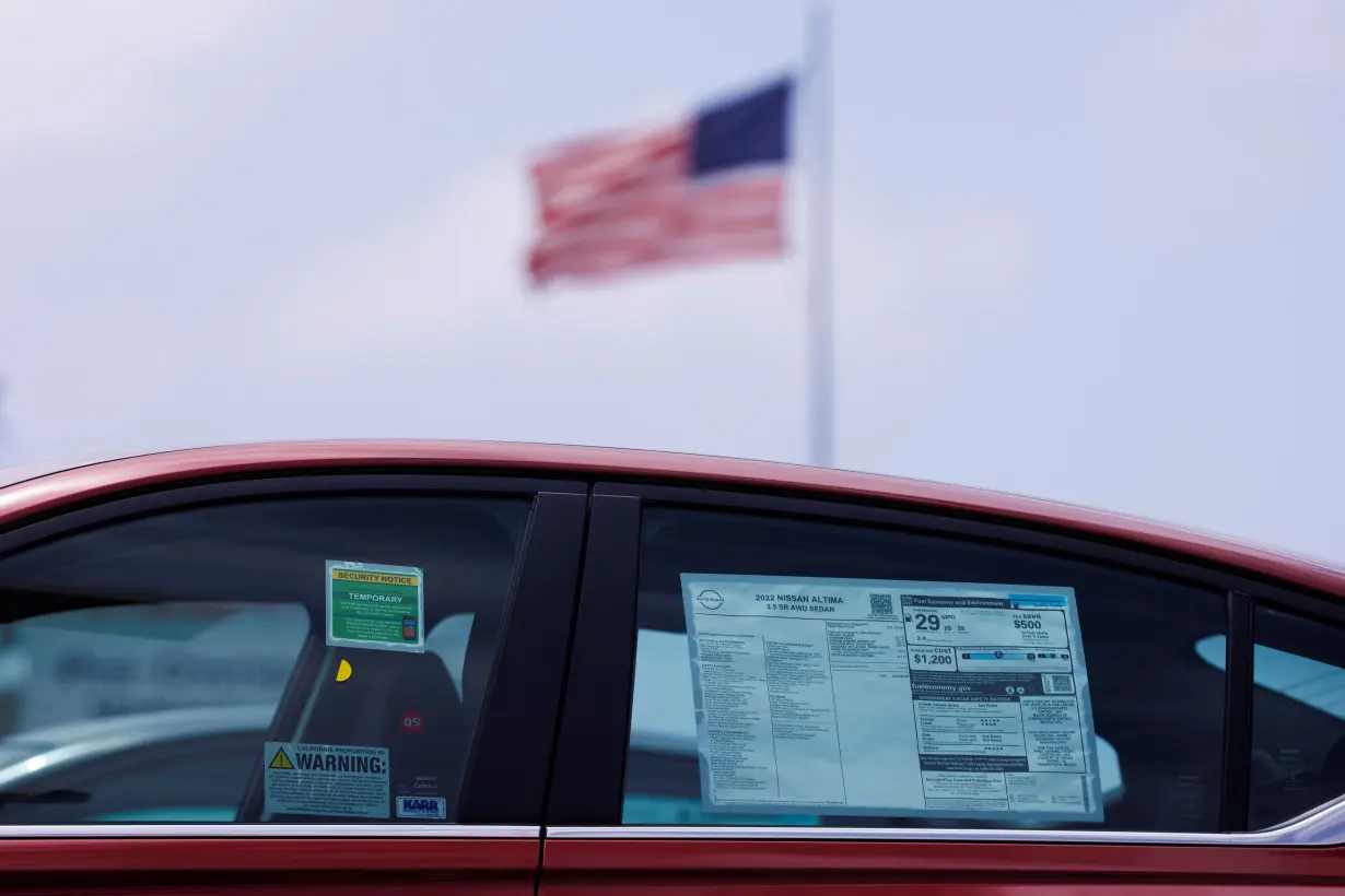 A car is shown for sale at a car lot in California