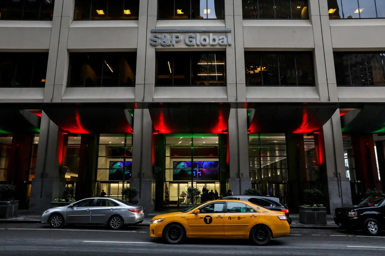 FILE PHOTO: The S&P Global logo is displayed on its offices in the financial district in New York