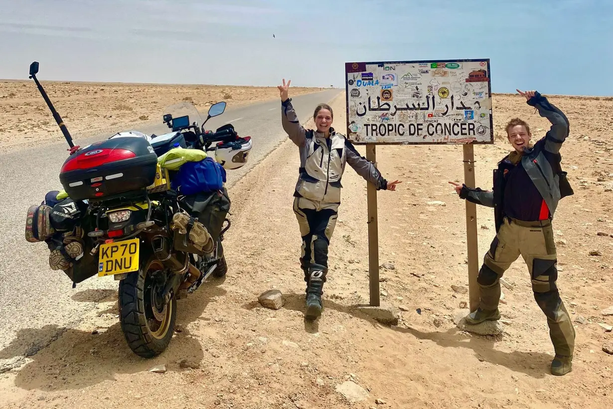 They set off around the world on a motorcycle and ‘fell off many times.’ Now they’re in the record books