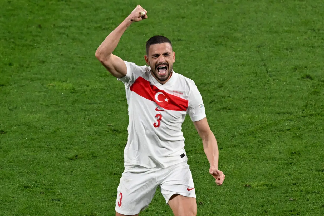 Merih Demiral scores twice as Turkey advances to Euro 2024 quarterfinals with victory over Austria in frenzied atmosphere
