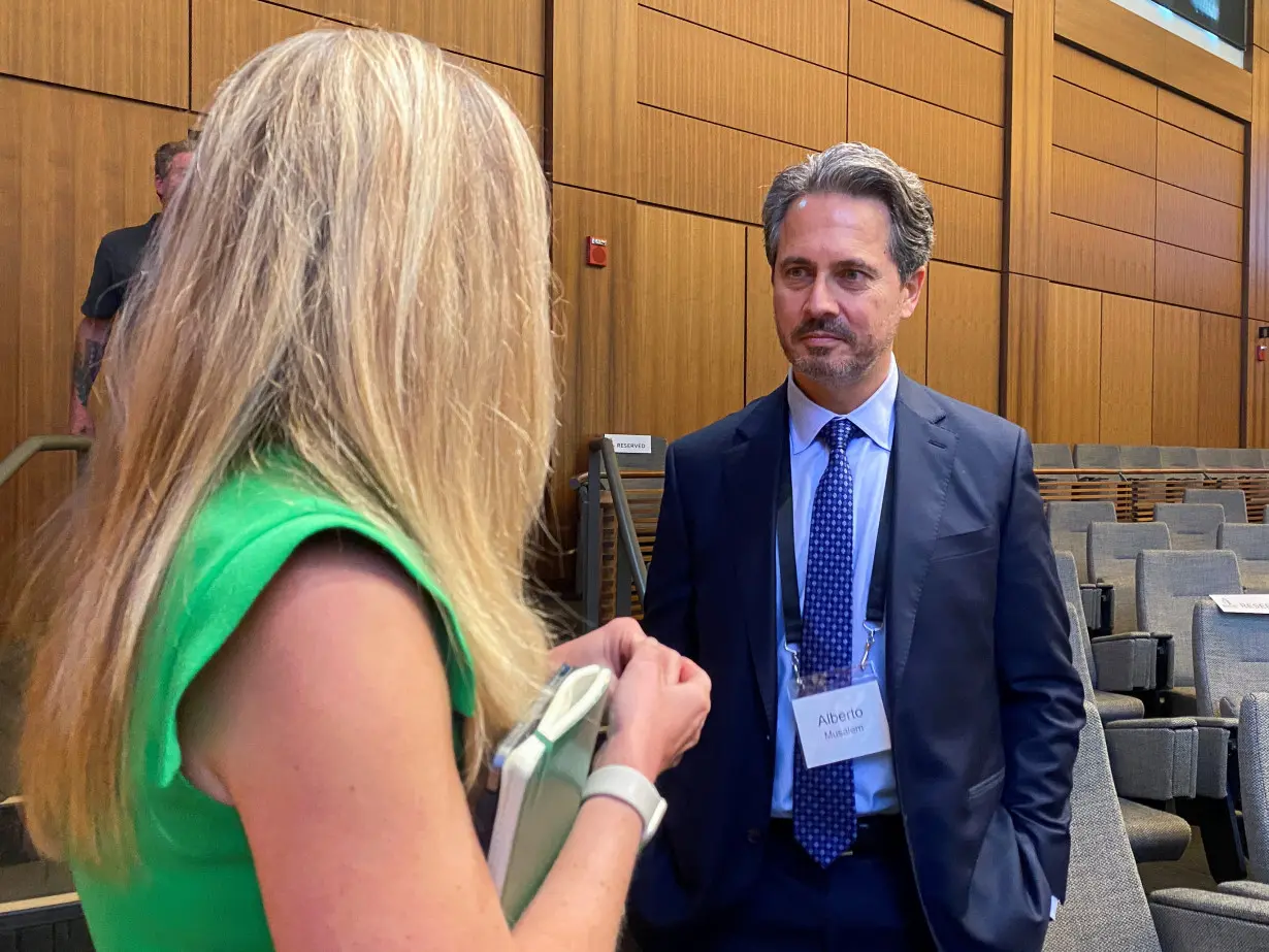 St. Louis Federal Reserve Bank President Alberto Musalem speaks with University of Pennsylvania professor Christina Parajon Skinner on the sidelines of a monetary policy conference at Stanford University's Hoover Institution in Palo Alto