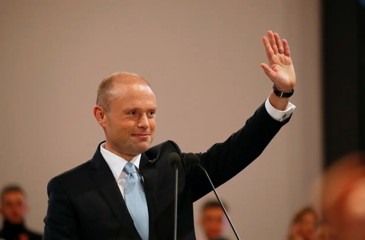 Outgoing Prime Minister and Labour Party leader Joseph Muscat waves to supporters after his final speech at the party's Congress before the election of a new party leader at the Corradino Sports Pavilion in Paola