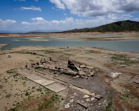 Parched Philippine dam reveals centuries-old town, luring tourists