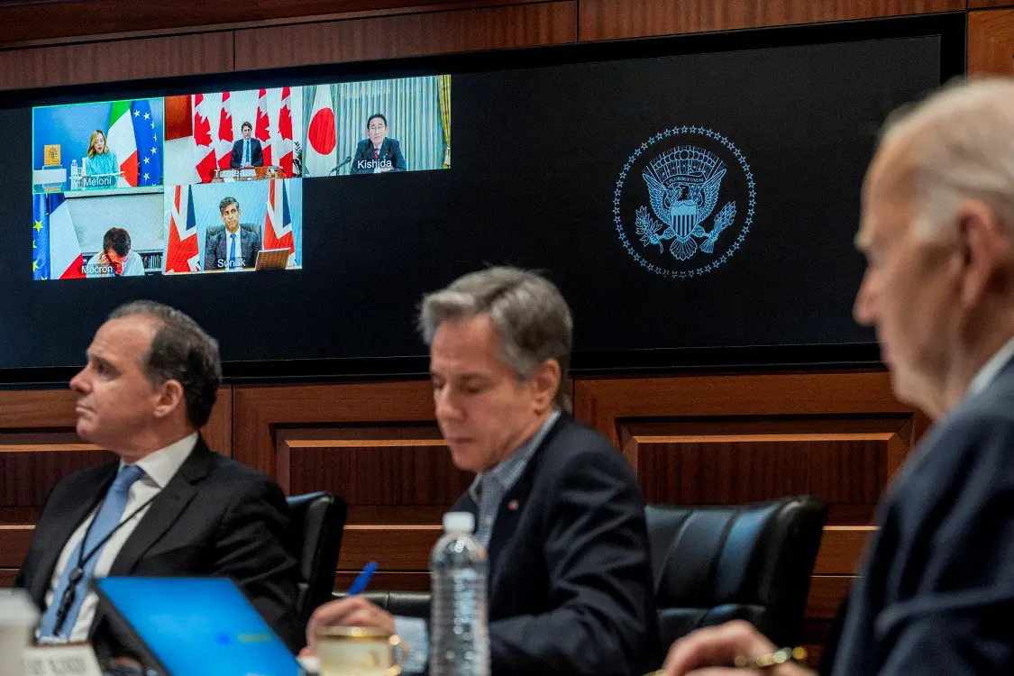 FILE PHOTO: U.S. President Joe Biden and U.S. Secretary of State Antony Blinken attend a video meeting with G7 leaders to discuss the Iranian attack on Israel at the White House in Washington