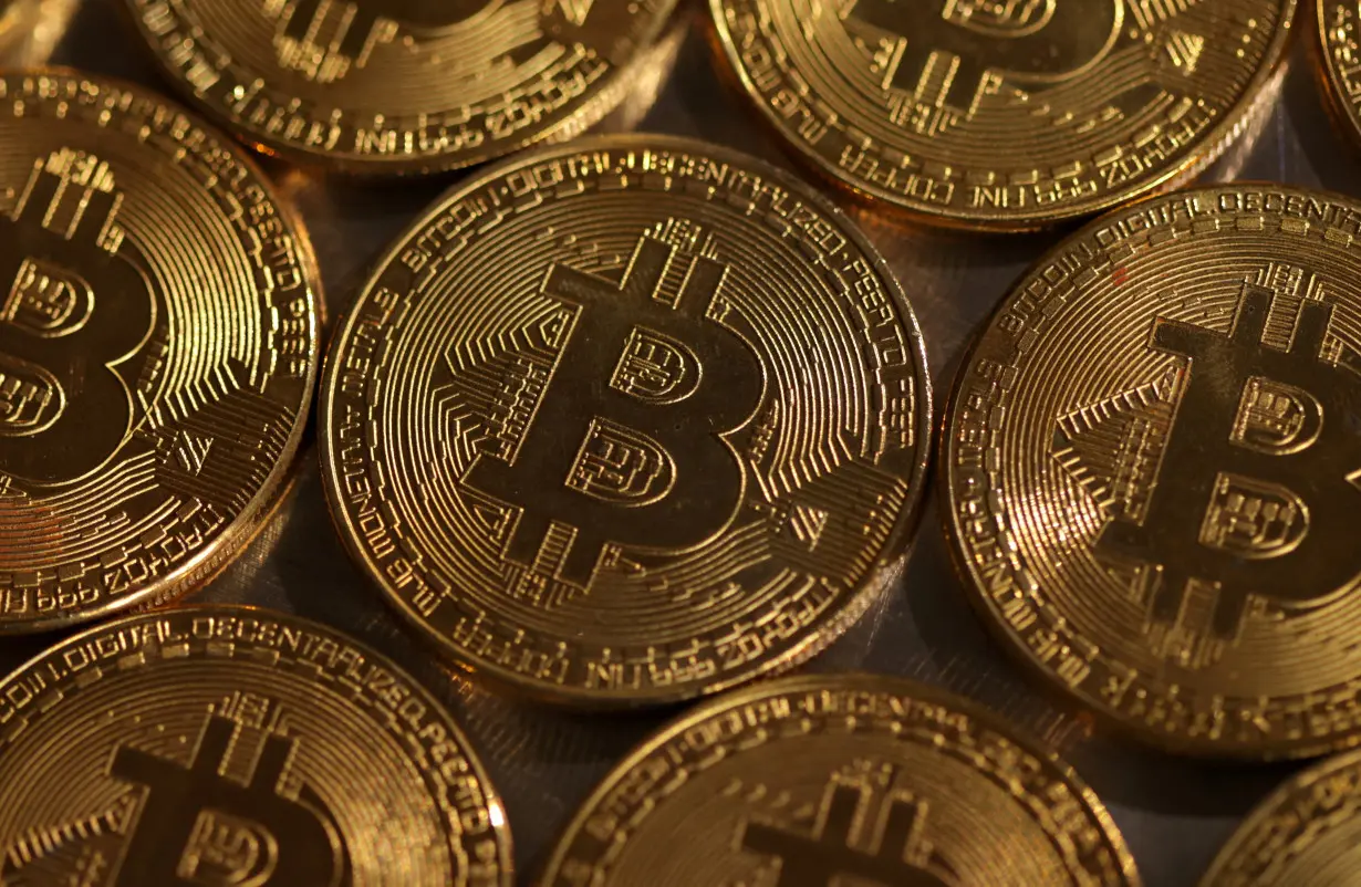 FILE PHOTO: Illustration shows representations of cryptocurrency Bitcoin