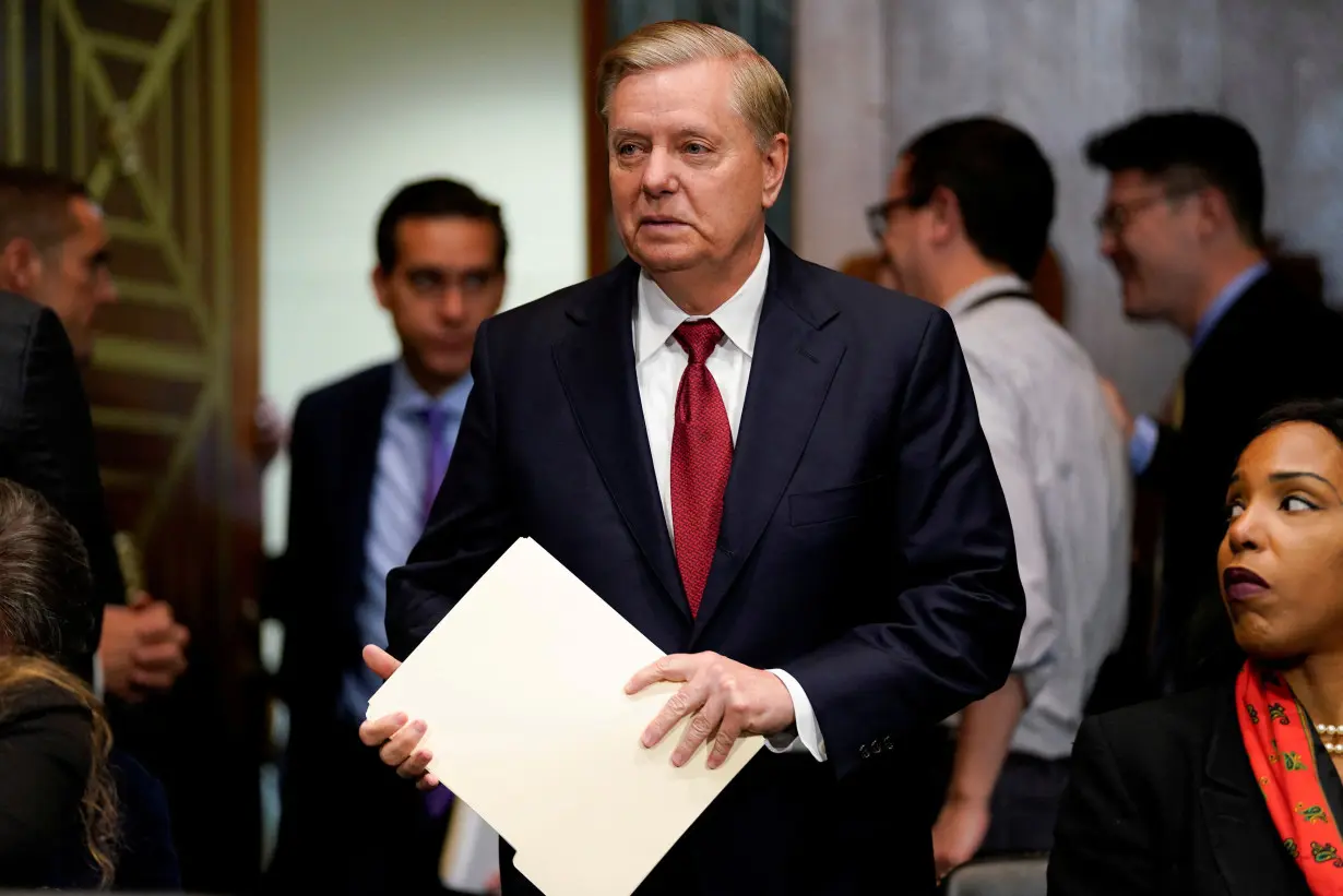 FILE PHOTO: Sen. Lindsay Graham (R-SC) arrives ahead of U.S. Attorney General William Barr testifying before a Senate Judiciary Committee hearing entitled 