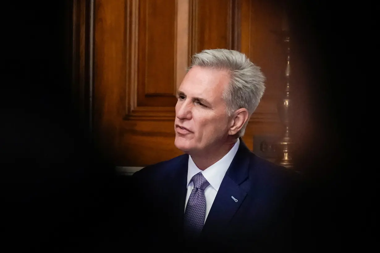 U.S. House Speaker Kevin McCarthy speaks to reporters in the U.S. Capitol after the House of Representatives passed a stopgap government funding bill to avert an immediate government shutdown, on Capitol Hill