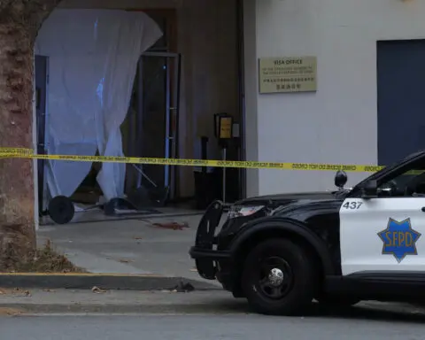 Driver who crashed into Chinese consulate carried knife, crossbow