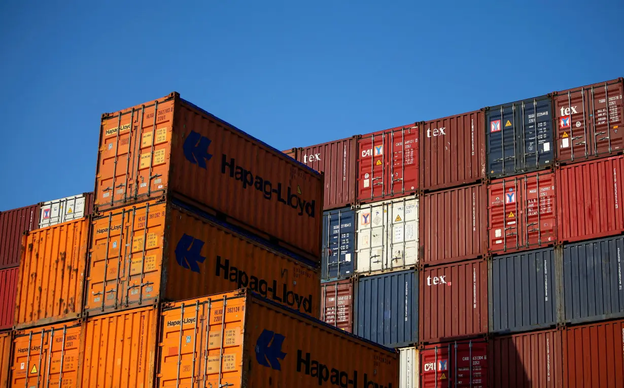 FILE PHOTO: Piled up containers at the harbour in Hamburg