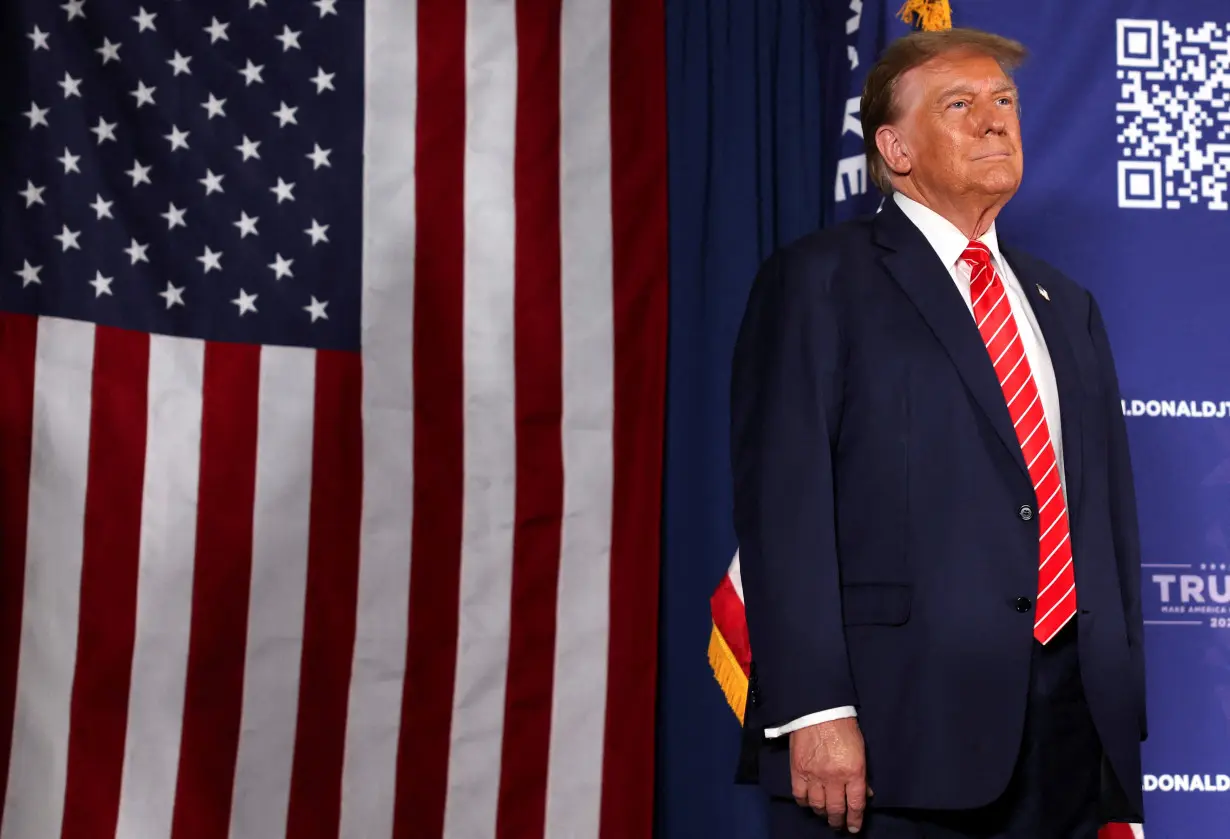 FILE PHOTO: Former U.S. President and Republican presidential candidate Donald Trump holds a rally in advance of the New Hampshire primary election in Laconia