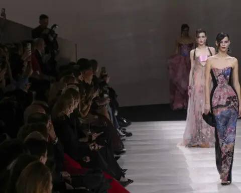 Chanel's spring couture show is a button-inspired ballet on the Paris runway