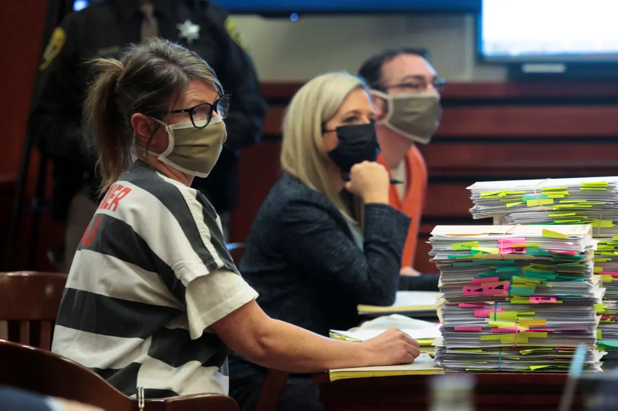 Jennifer Crumbley, parent of accused Oxford High School gunman Ethan Crumbley, listens during a court procedural hearing, in Rochester Hills