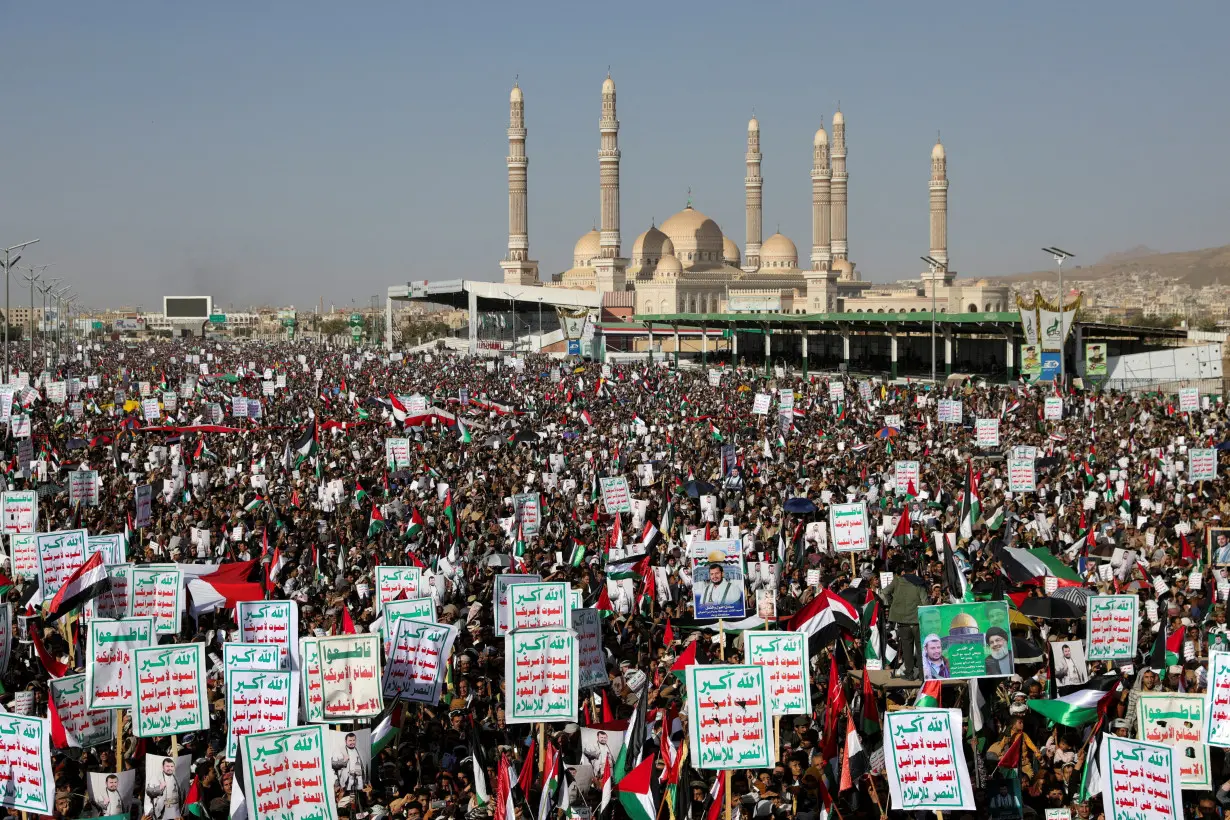 FILE PHOTO: Houthi supporters rally after US, Britain carry out strikes against Houthis