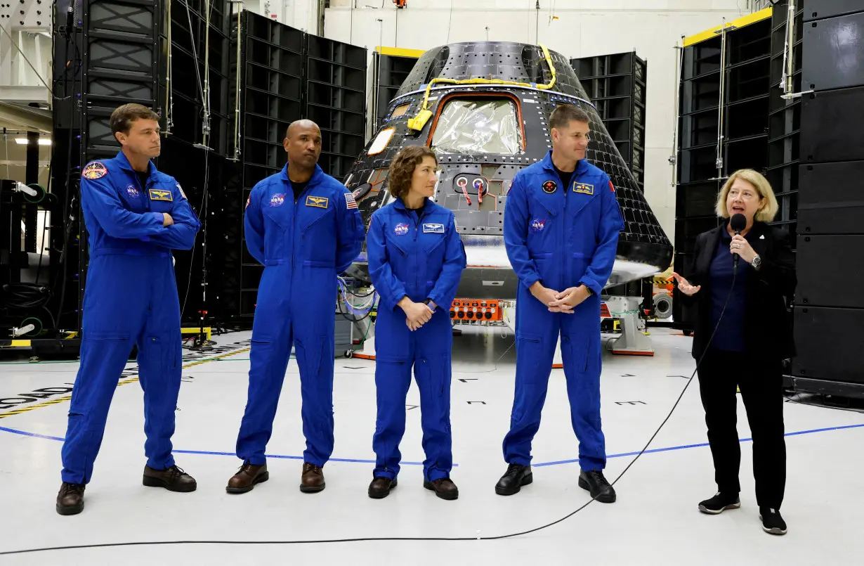 FILE PHOTO: Astronauts for NASA's Artemis II mission, take part in a press conference to discuss progress for their mission around the Moon and back to Earth, at the Kennedy Space Center in Cape Canaveral