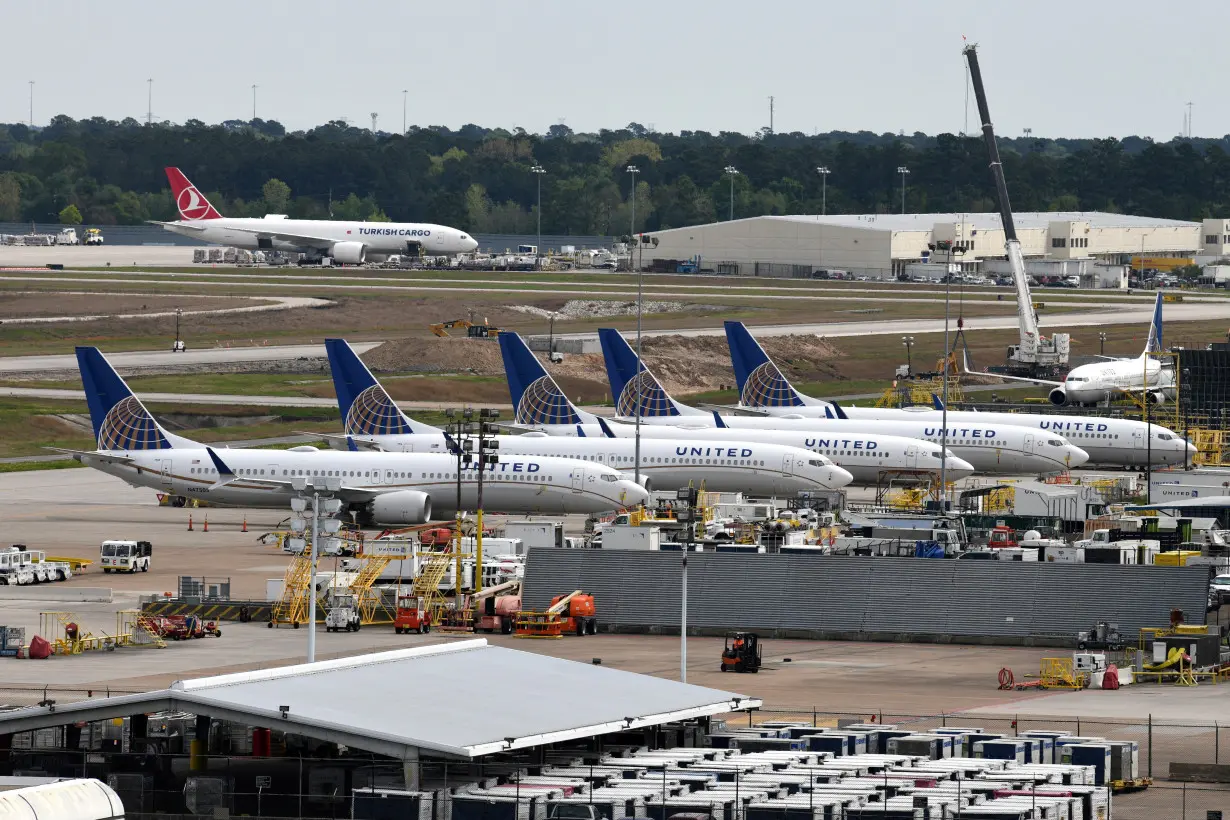 FILE PHOTO: United Airlines planes, including a Boeing 737 MAX 9 model, are pictured at George Bush Intercontinental Airport in Houston