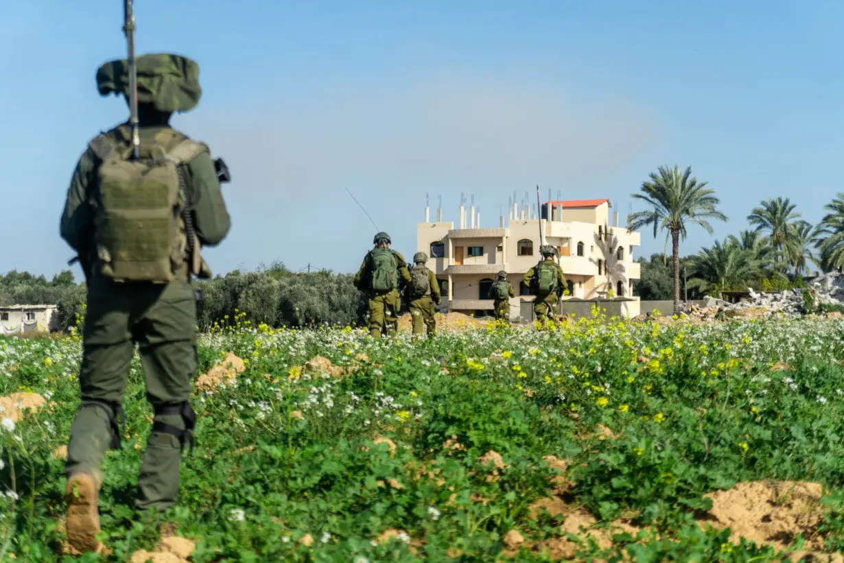 Israeli soldiers operate in the Gaza Strip