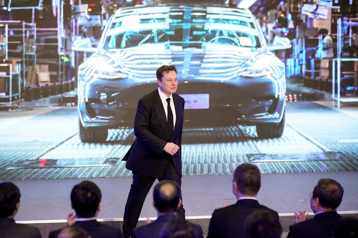 FILE PHOTO: Tesla Inc CEO Elon Musk attends an opening ceremony for Tesla China-made Model Y program in Shanghai