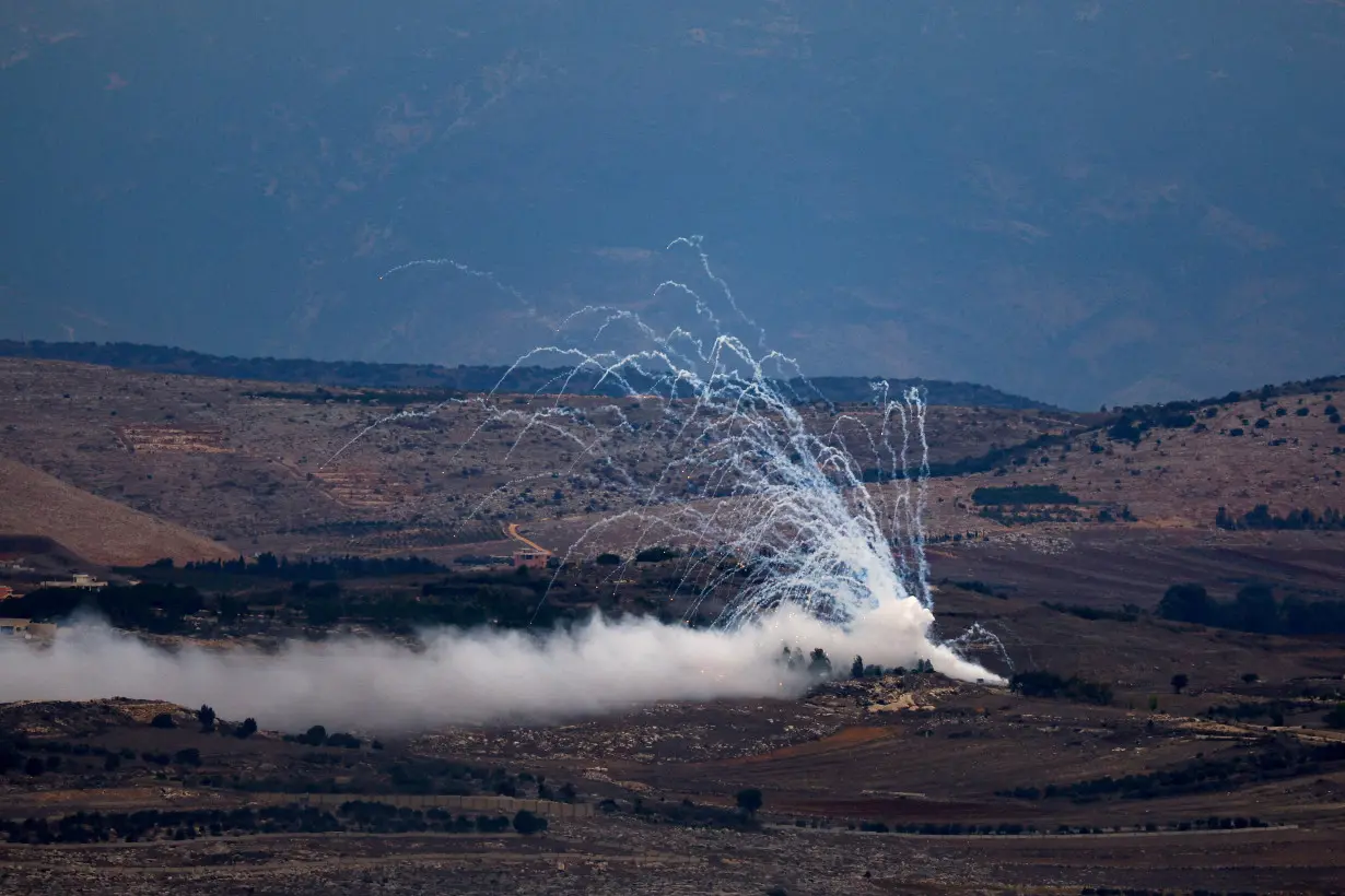 FILE PHOTO: White phosphorus fired by Israeli army to create a smoke screen on the Israel-Lebanon border