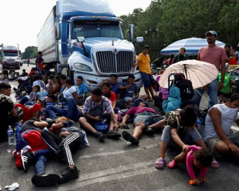 Mexican officials detain group of migrants at capital bus terminal