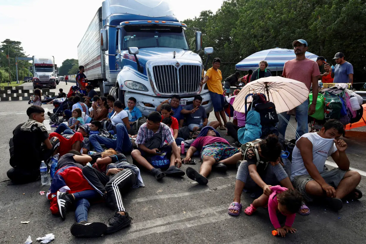 FILE PHOTO: Migrants protest as they attempt to reach the U.S. border, in Huixtla