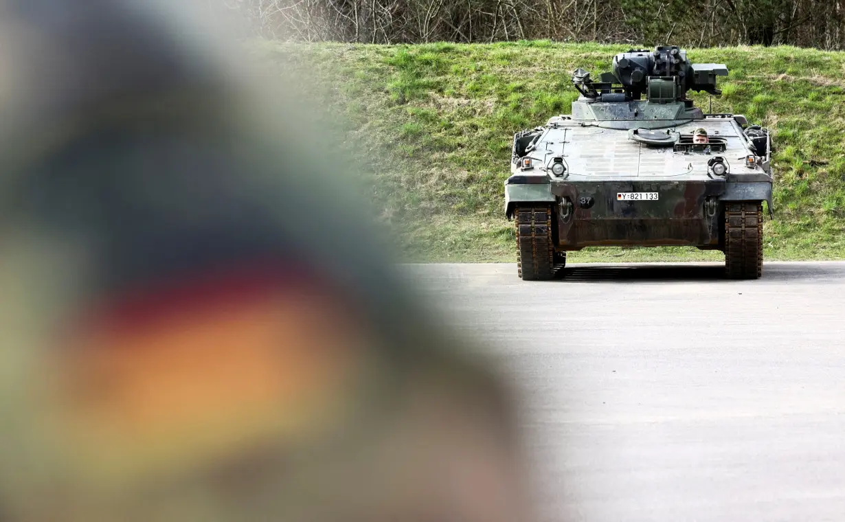 FILE PHOTO: German Defence Minister Pistorius and German President Steinmeier visit Ukrainians undergoing Leopard tank training in Klietz