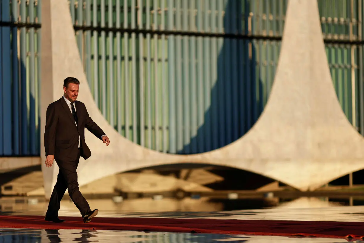 Brazil's Agriculture Minister Carlos Favaro walks before a meeting at the Alvorada Palace in Brasilia