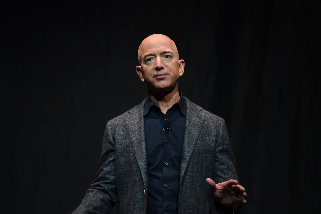 Founder, Chairman, CEO and President of Amazon Jeff Bezos speaks during an event about Blue Origin's space exploration plans in Washington