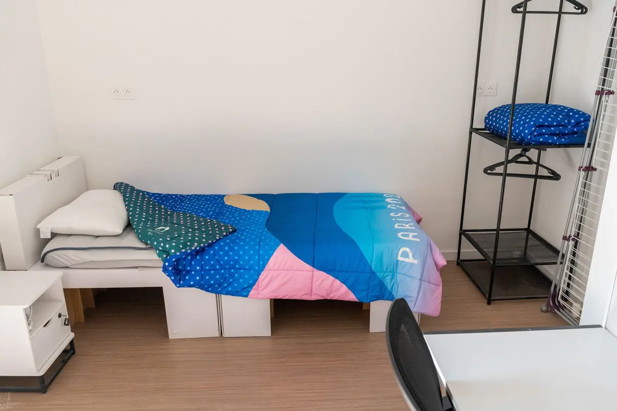 A cardboard bed inside an athletes' room at the Olympic Village in Saint Denis, France.