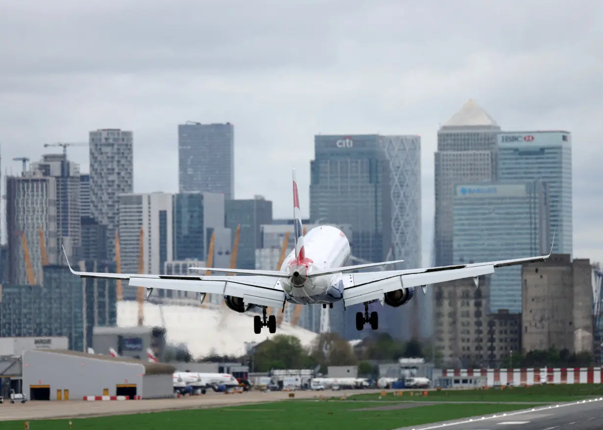 FILE PHOTO: A British Airways Embraer ERJ-190SR takes off from London City Airport