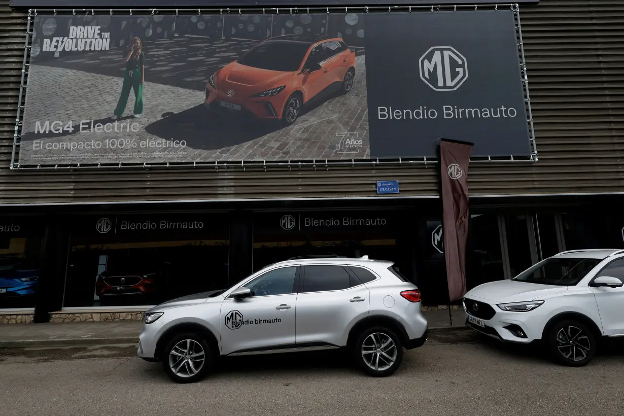 FILE PHOTO: A poster for an MG-4 EV is displayed at a car showroom in Santander