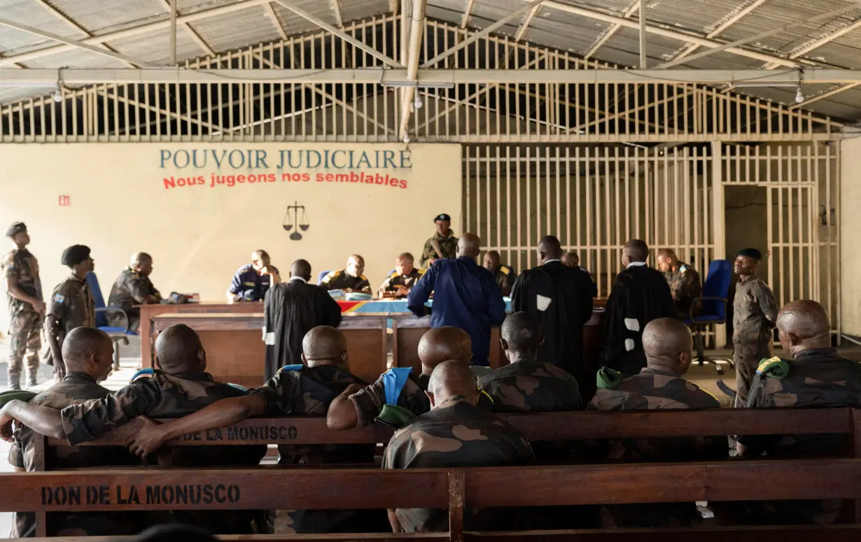 FILE PHOTO: Members of the Congolese Army accused of desertion and cowardice when fighting M23 rebels are sentenced at the military courtroom in Goma